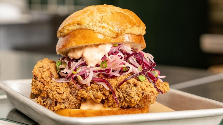 Rubato Food chicken sandwich on a white plate