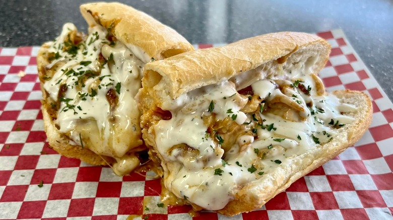 Tony's Butcher Block creamy buffalo chicken sub on checkered paper