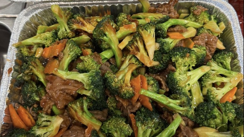 Beef Broccoli Chinese dish from Great Wall restaurant, in aluminum tray.