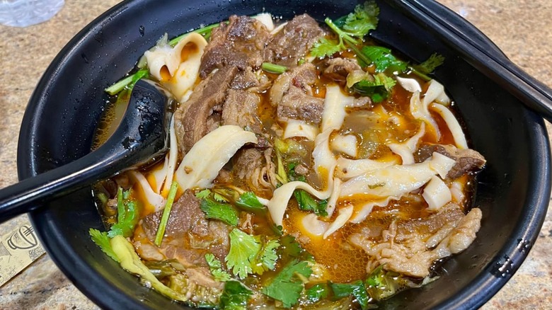 Spicy beef shaved noodles from Nan Zhou Hand Drawn Noodle House.