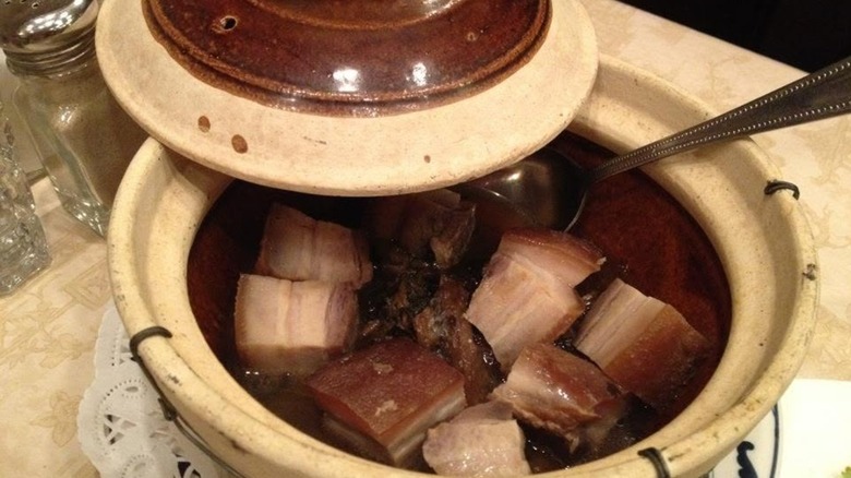 Pork Belly served in covered dish with spoon from Emperor of China.