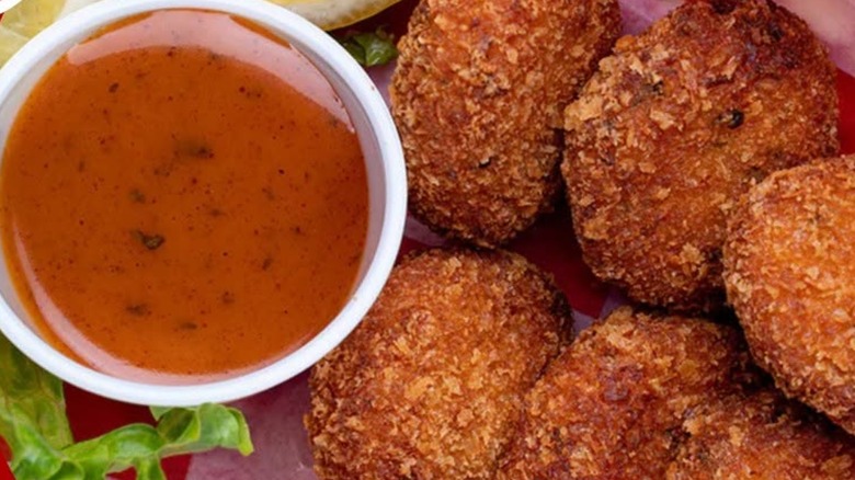 Tracy's crab cakes alongside Tracy's crab bisque at Tracy's King Crab Shack