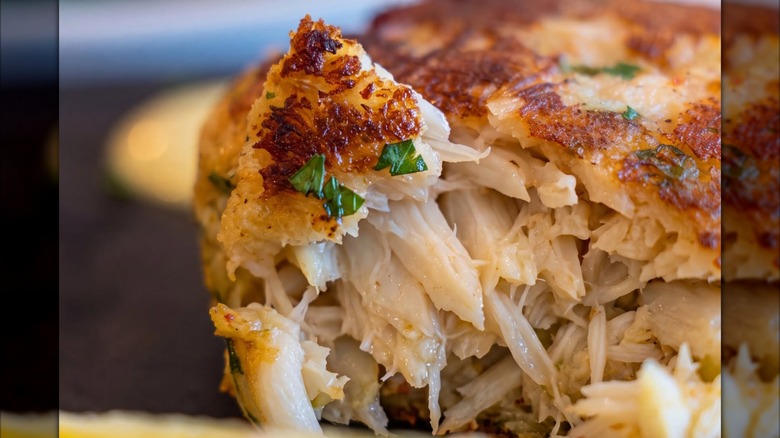 Upclose shot of Crab cake sliced open at Paula's On Main