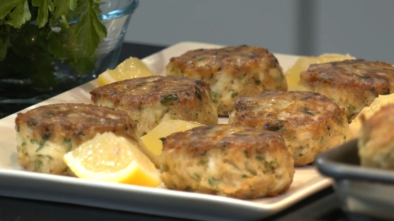 Tray of Crab Cakes with lemon wedges from Saltbox Seafood Joint