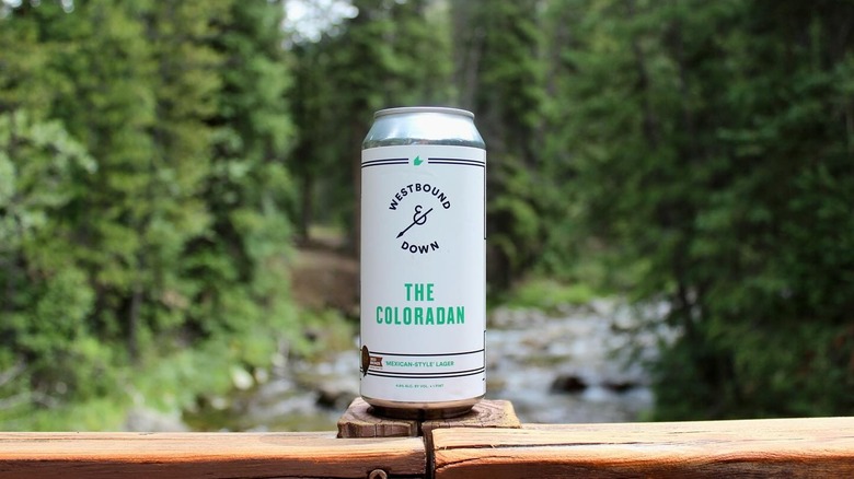 The Coloradan beer on wood bridge
