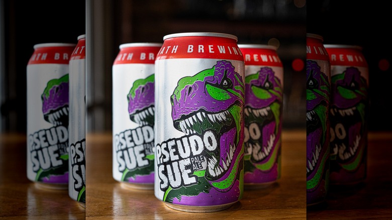 Three Pseudo Sue beer cans
