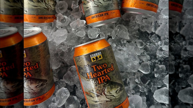 Two hearted IPA orange beer cans on ice