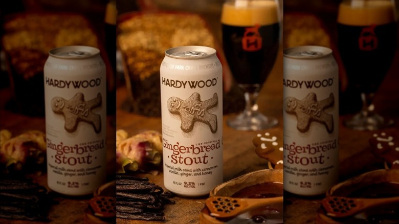 White tall boy beer can of Hardywood gingerbread stout with goblet in background filled with dark beer