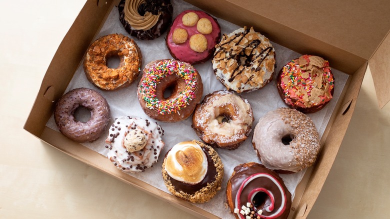 Colorful donuts in box