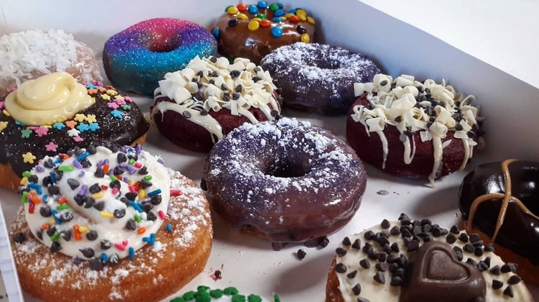 Colorful donuts in box