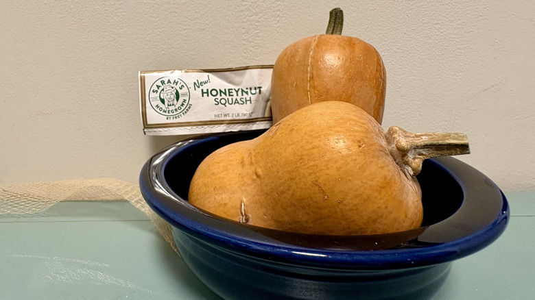 A bowl with two honeynut squashes from Aldi