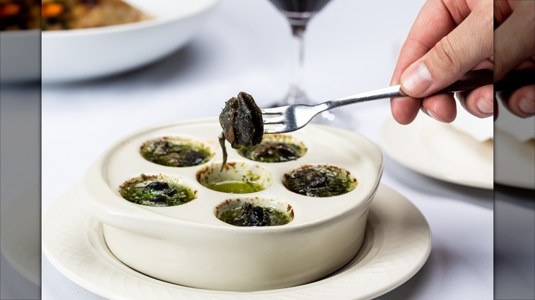 Escargot in a escargot specialty bowl