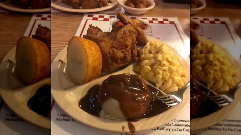 G´s Country Kitchen plate of fried chicken with sides of cornbread muffin mac and cheese and mashed potatoes and gravy