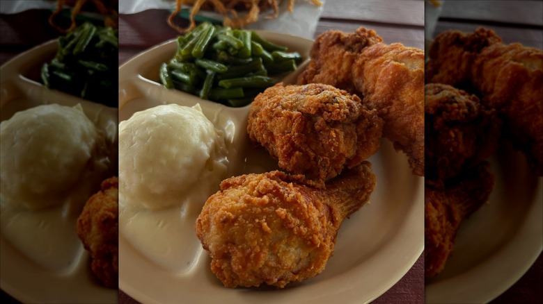 Chicken Mary's fried chicken with sides of mashed potatoes and green beans
