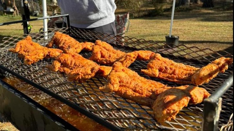 Bernard Hardison and Premium Exotic Catering fried chicken being made on outdoor big backyard grill