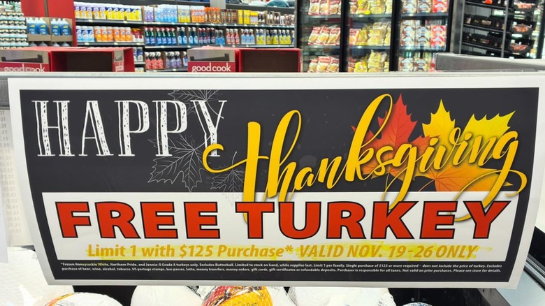 WinCo free turkey with $125 purchase sign in store