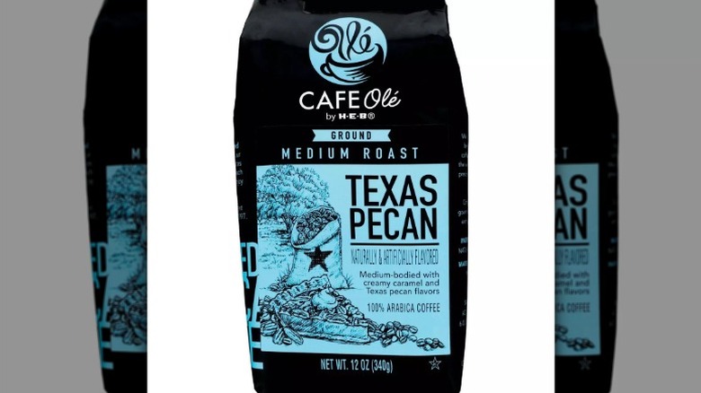 black and blue bag of Cafe Olé Texas Pecan ground coffee