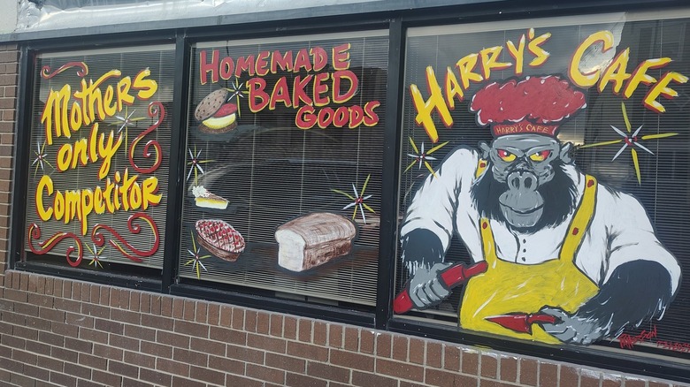 Exterior of Harry's Cafe with colorful painted windows
