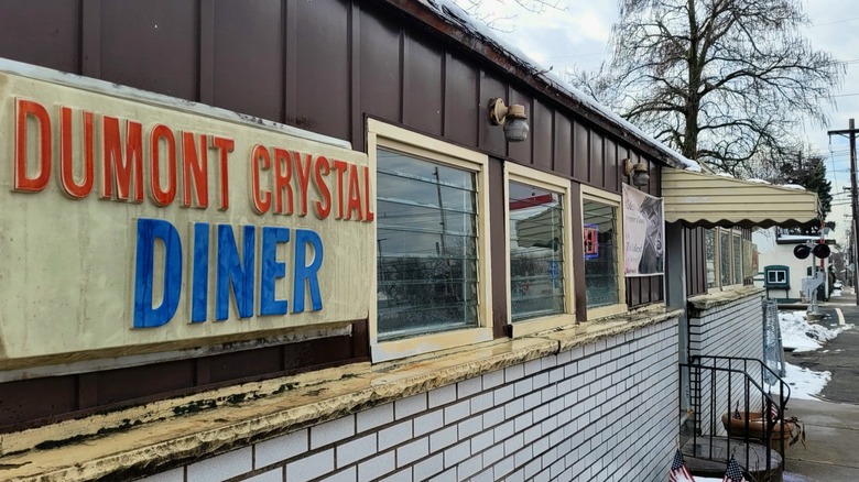 Dumont Crystal Diner exterior with a red and blue sign