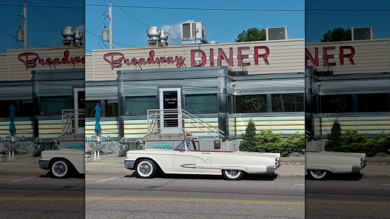 Broadway Diner exterior with vintage cadillac parked in front