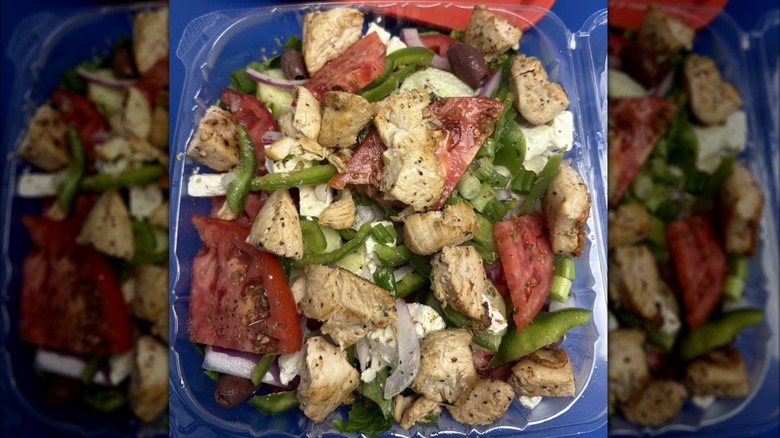 Greek Salad with Chicken in a plastic to-go container from Opa! Opa!