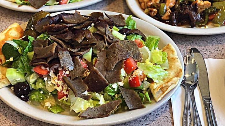 Greek salad topped with gyro meat at Evan's Restaurant
