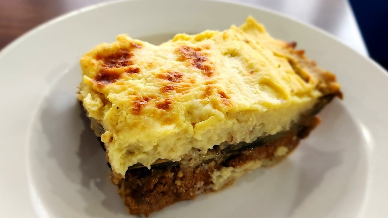 Moussaka on a white plate from Santorini Family Restaurant