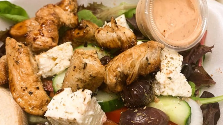 Mediterranean salad with jerk chicken from Cosmos Cafe
