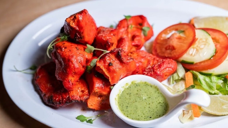 Chicken tikka from Turmeric Indian cafe and bar on a white plate