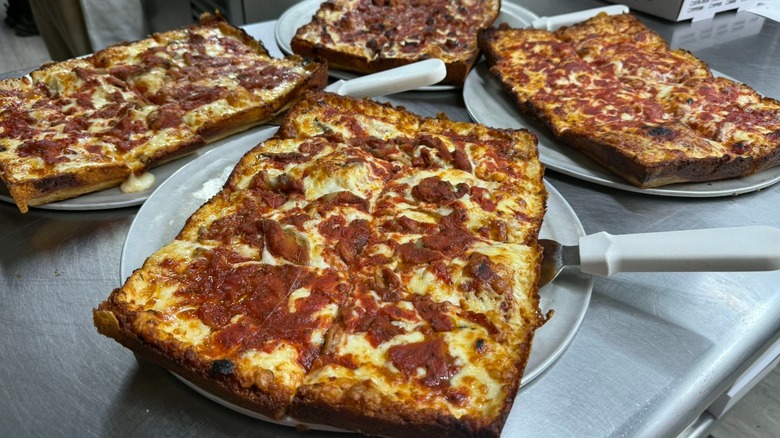 Several Detroit Style pepperoni pizzas from Loui's Pizza