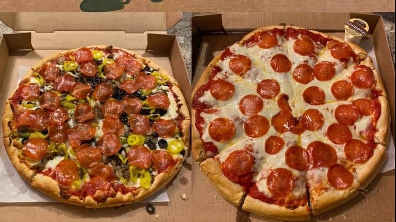 Two whole pizzas, pepperoni and pepperoni with banana peppers and olives, from Pizza Villa