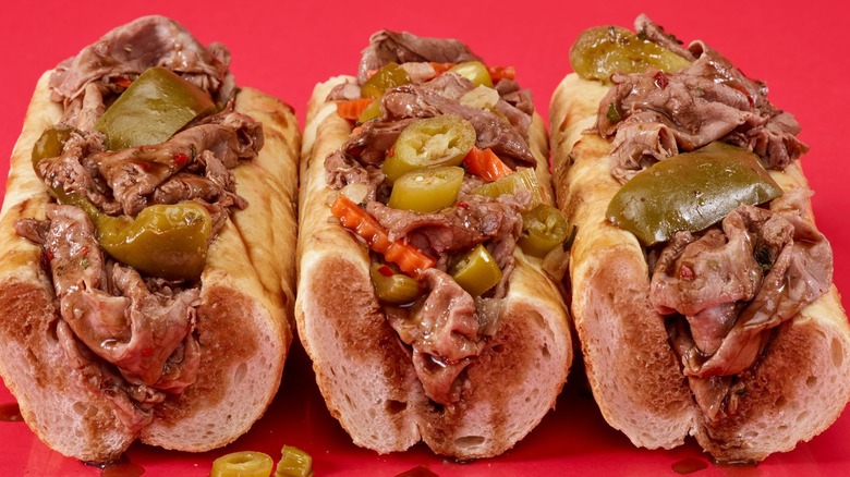 Three Italian beef sandwiches in a row, from Portillo's