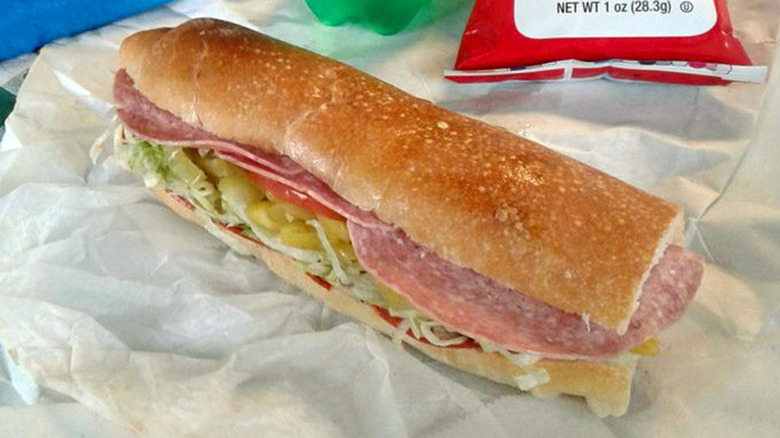 A Dee's Deli Italian grinder on butcher paper