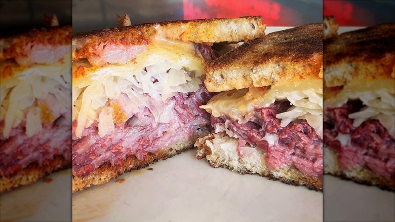 Close up of a Reuben cut in half