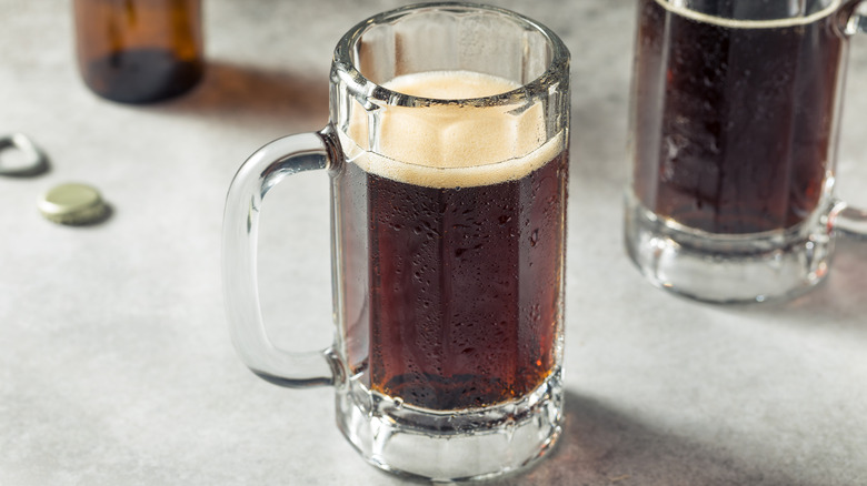 Root beer in tall glass mug
