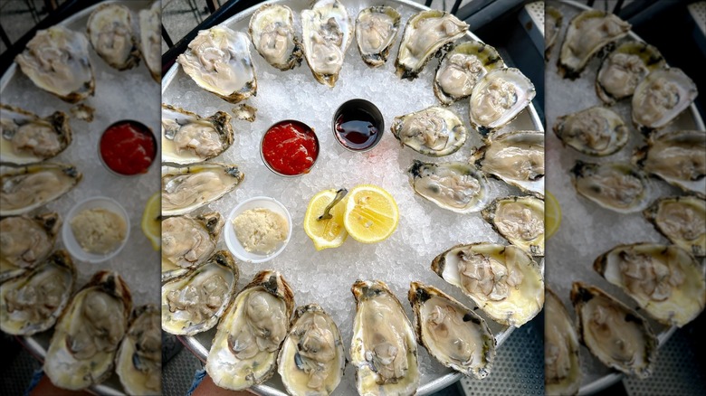 Oysters on ice with condiments