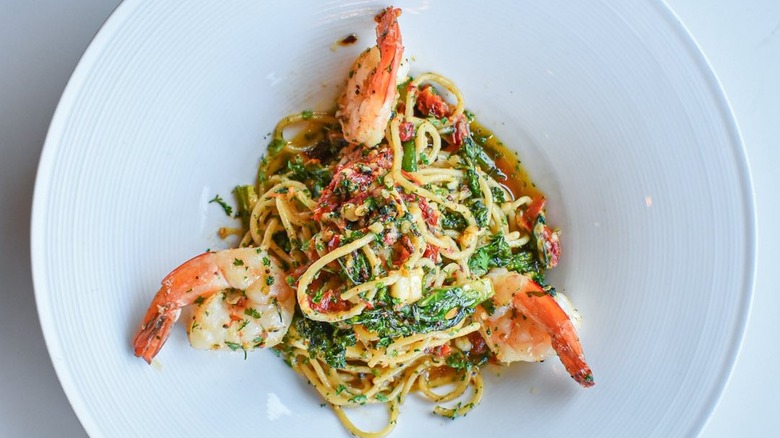 Olive oil spaghetti with shrimp on top