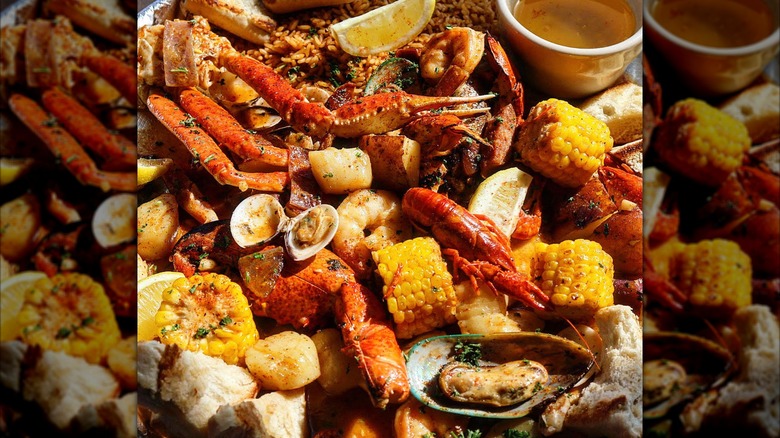 Seafood broil with a side of dipping sauce