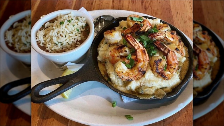Blackened shrimp on a bed of grits