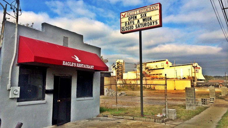 eagles soul food restaurant store front with red awning and restaurant eagle logo
