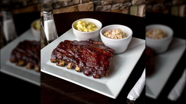 Neil Street Blues ribs on white plate with sides