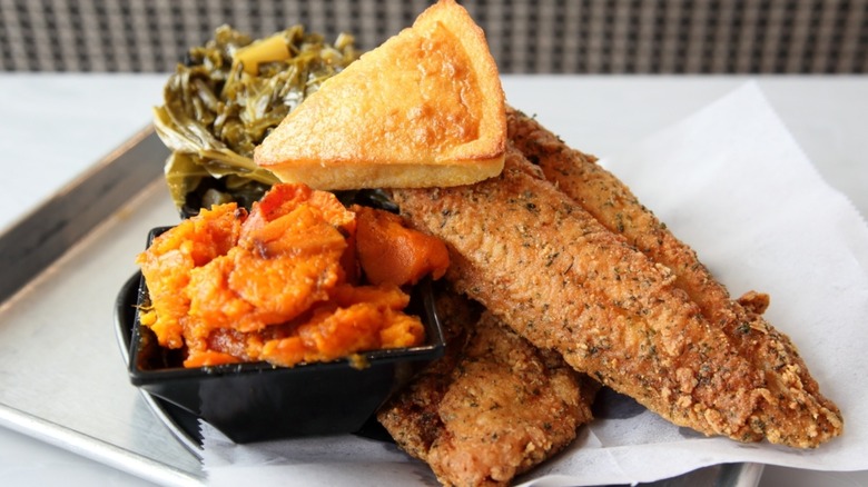 Cornbread soul fried catfish with corn bread and sweet potatoes
