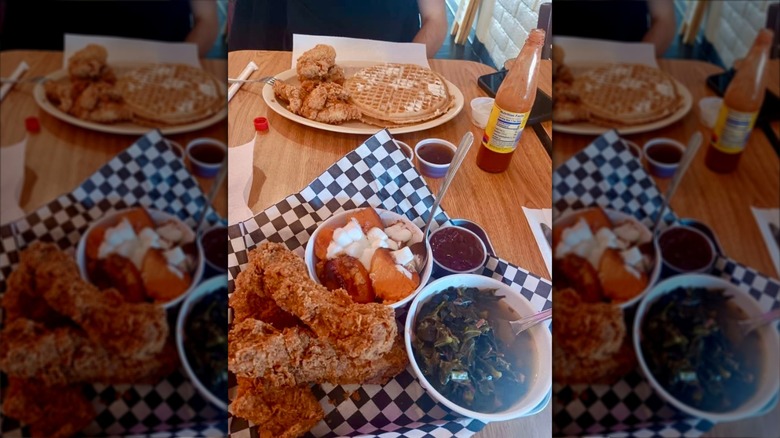 Fried chicken, waffles, and bowls of vegetables and sweet potatoes
