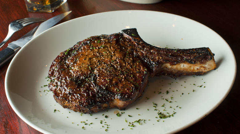 Steak served on plate at steakhouse