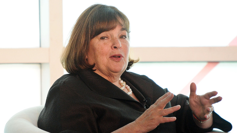 Ina garten on sitting on stage and speaking