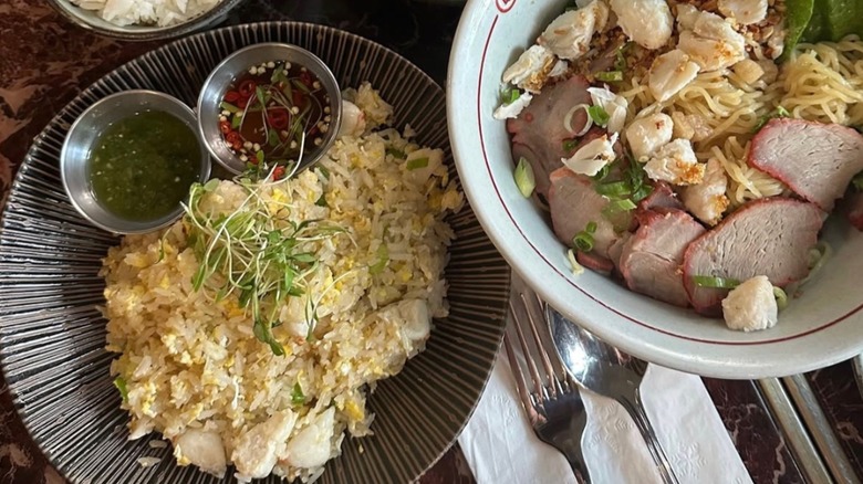 Various Thai dishes arranged on a table at Soothr