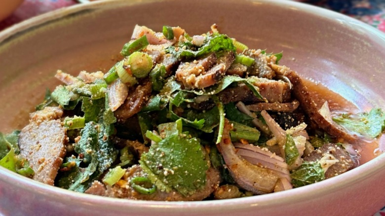 Namtok Kor Moo Yang (pork collar tossed with fresh Thai herbs) at Bangkok Belly