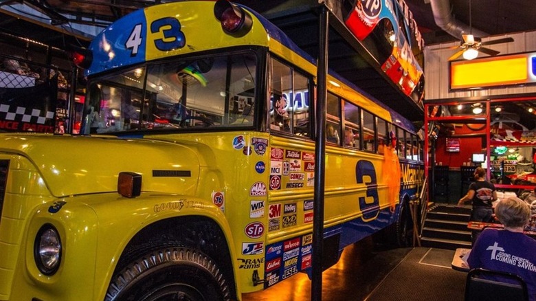 Lancaster's BBQ interior with bus, race car, and other race theme decor