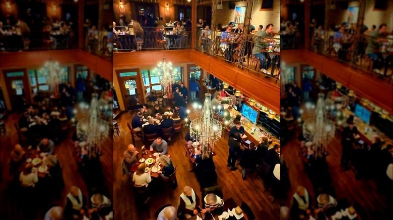 The Bourbon Street Barrel Room interior dining room with chandelier