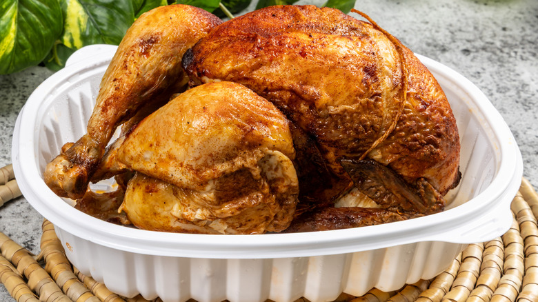 Grocery store rotisserie chicken in plastic container